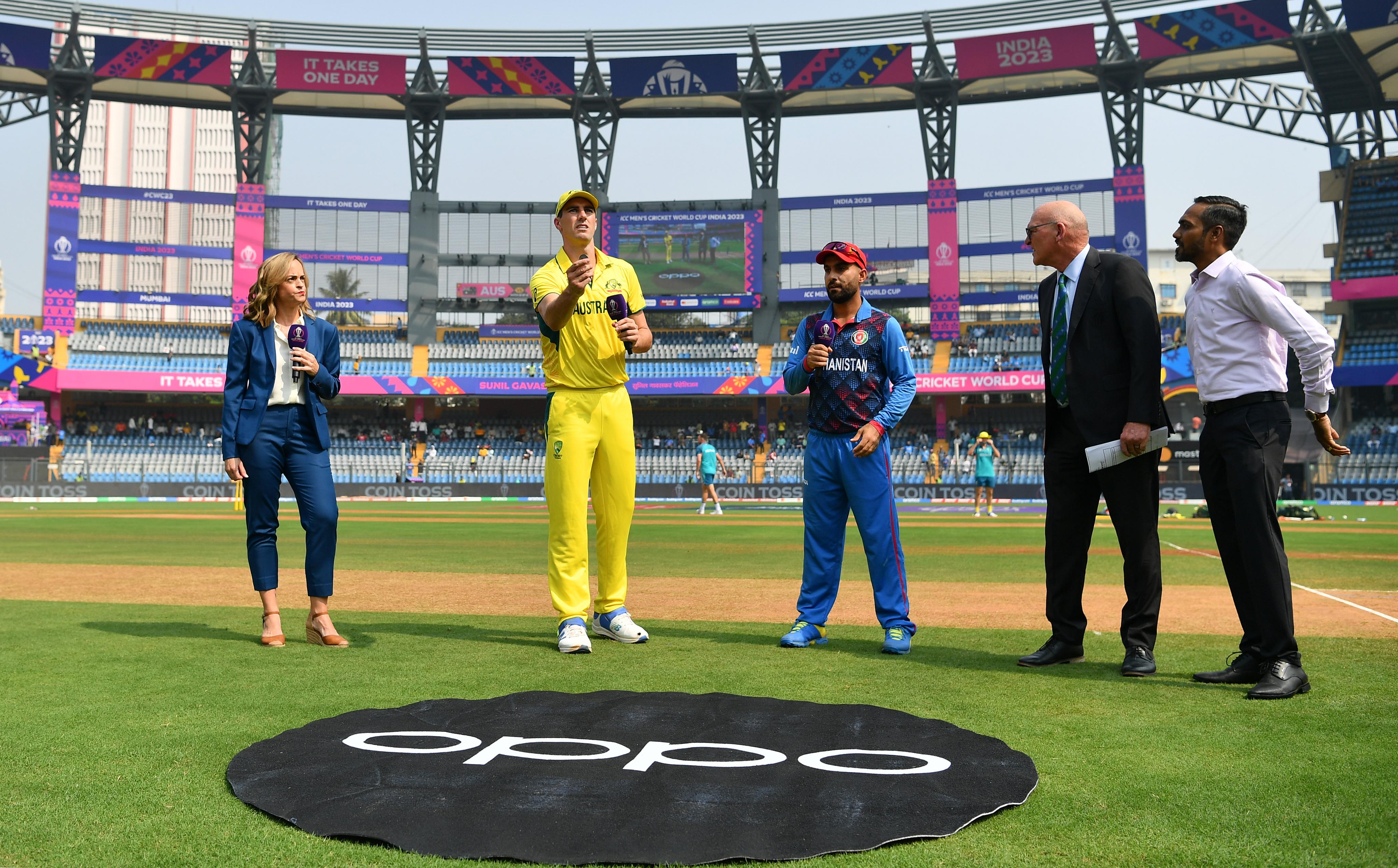 Hashmatullah Shahidi with Australia captain Pat Cummins