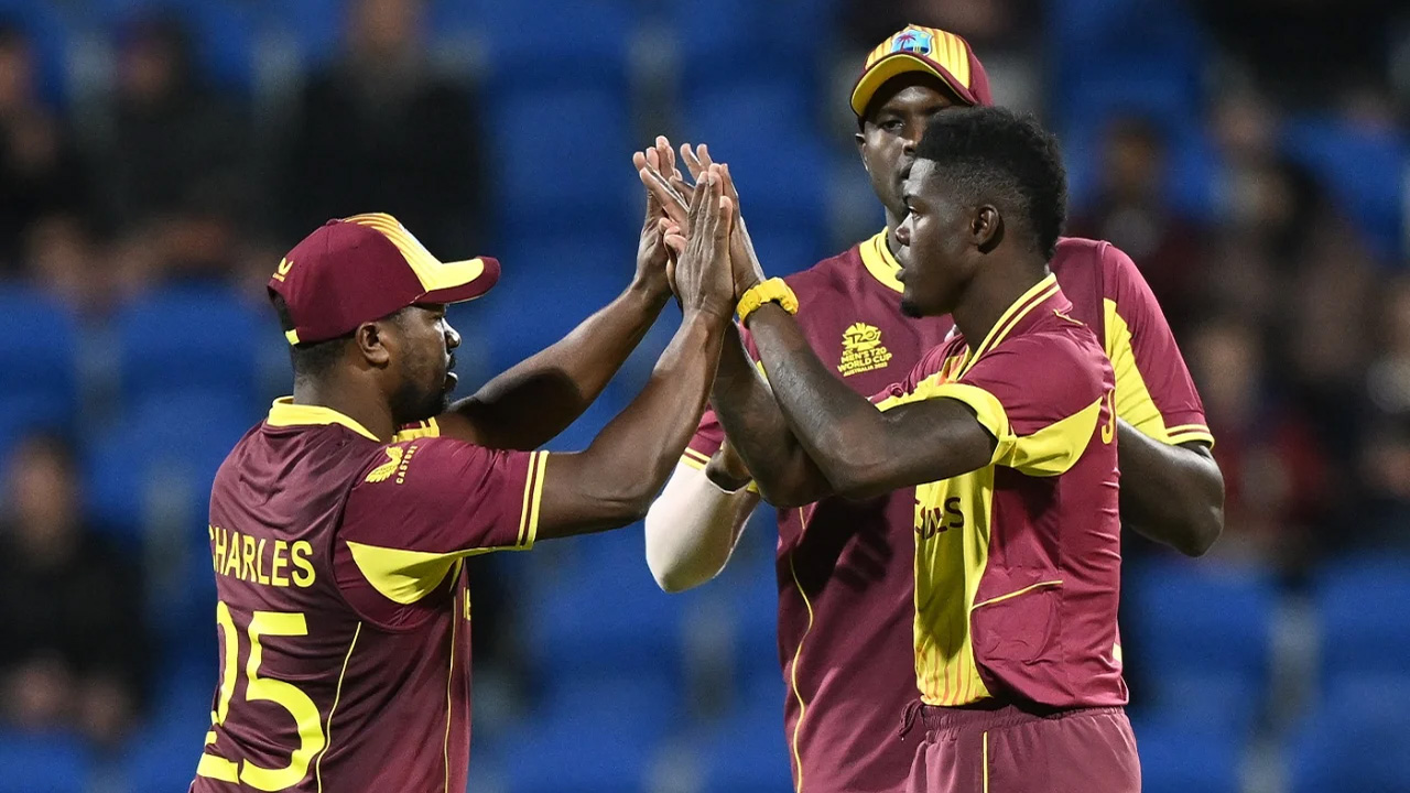Alzarri Joseph Celebrates With Team Mates After Getting Regis Chakabva
