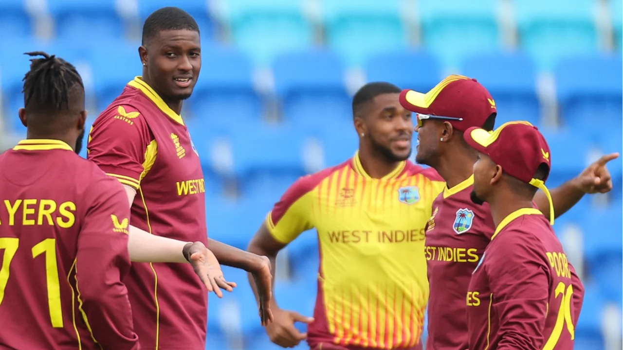 Jason Holder Celebrates With His Team Mates