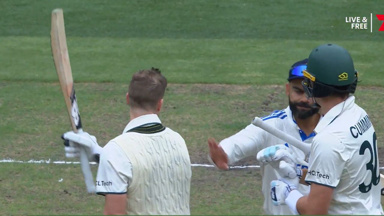 Virat Kohli Pats On The Back Of Steve Smith