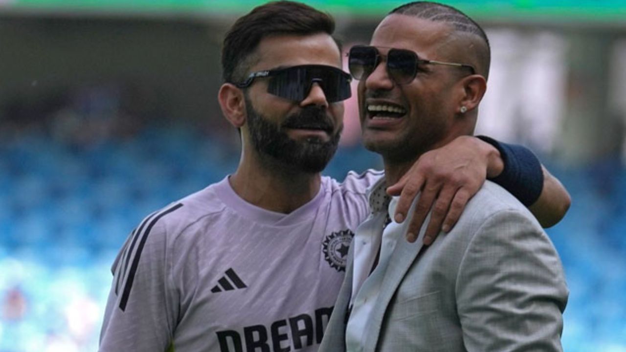 Shikhar Dhawan puts divine pressure on Virat Kohli to complete 100 international centuries