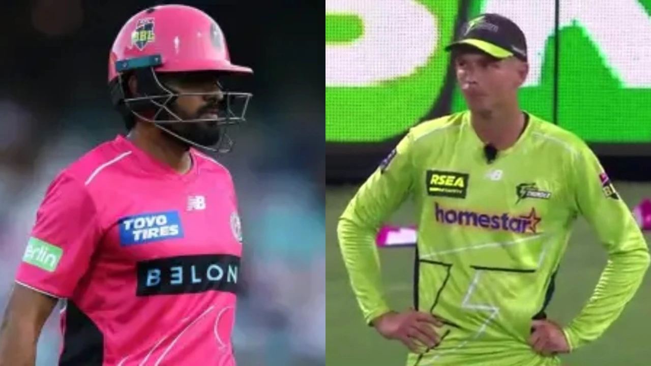 Babar Azam and Chris Green