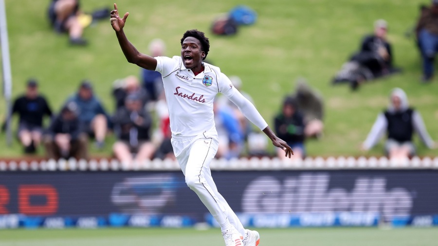 West Indies Chemar Holder celebrates New Zealand's Tom Latham being caught during the 2nd International cricket Test match between New Zealand and the West Indies at the Basin Reserve in Wellington on December 11, 2020. (Photo by Marty MELVILLE / AFP) (Photo by MARTY MELVILLE/AFP via Getty Images)