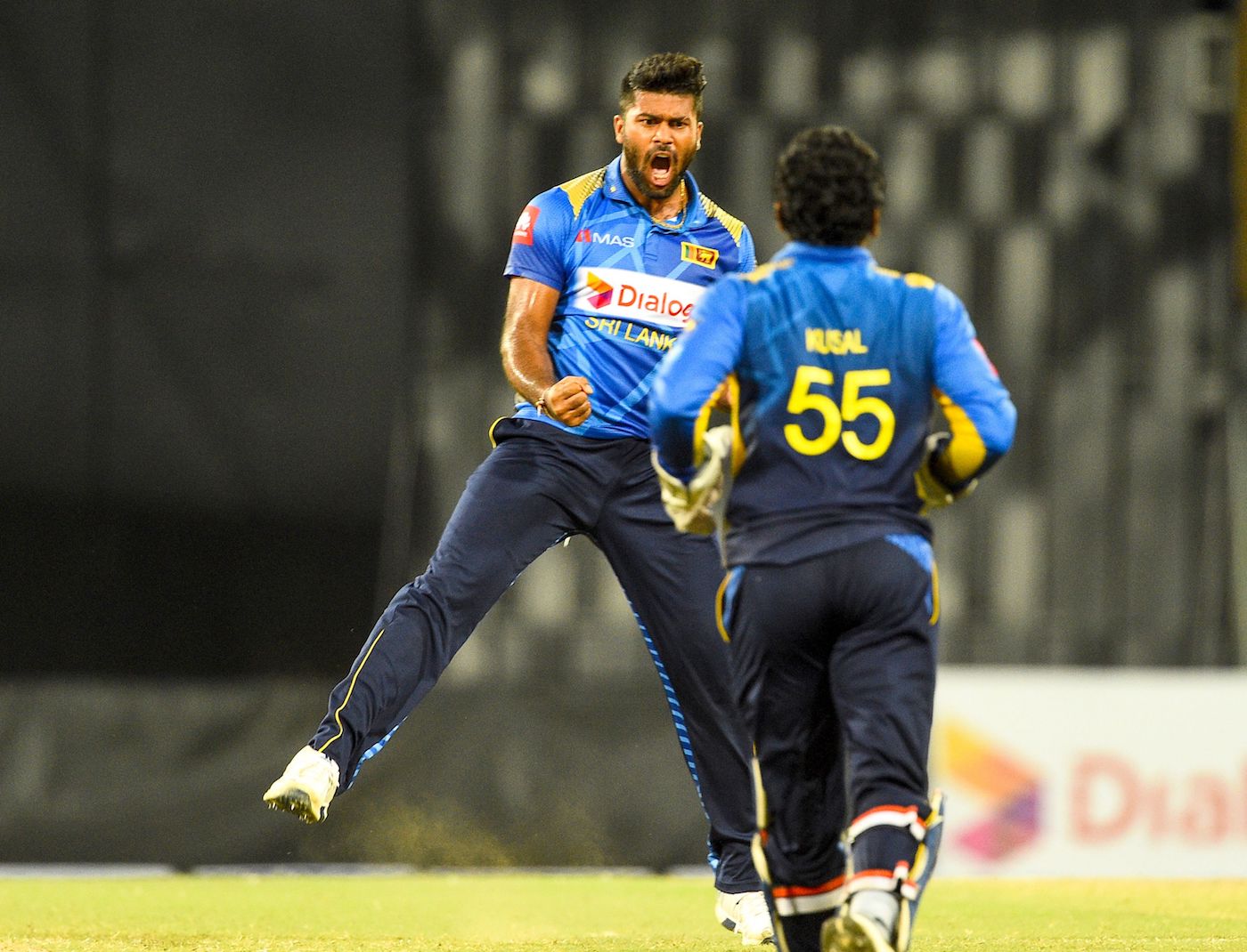 Sri Lankan cricketer Lahiru Kumara (L) celebrates with teammates after dismissing Bangladeshi cricketer Mehidy Hasan during the third one day international (ODI) cricket match of a three-match ODI series between Sri Lanka and Bangladesh at R. Premadasa Stadium in Colombo on July 31, 2019. (Photo by ISHARA S. KODIKARA / AFP) (Photo credit should read ISHARA S. KODIKARA/AFP/Getty Images)