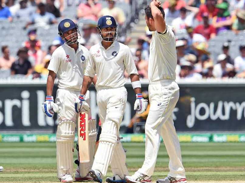 Ajinkya Rahane, Virat Kohli, and Mitchell Johnson