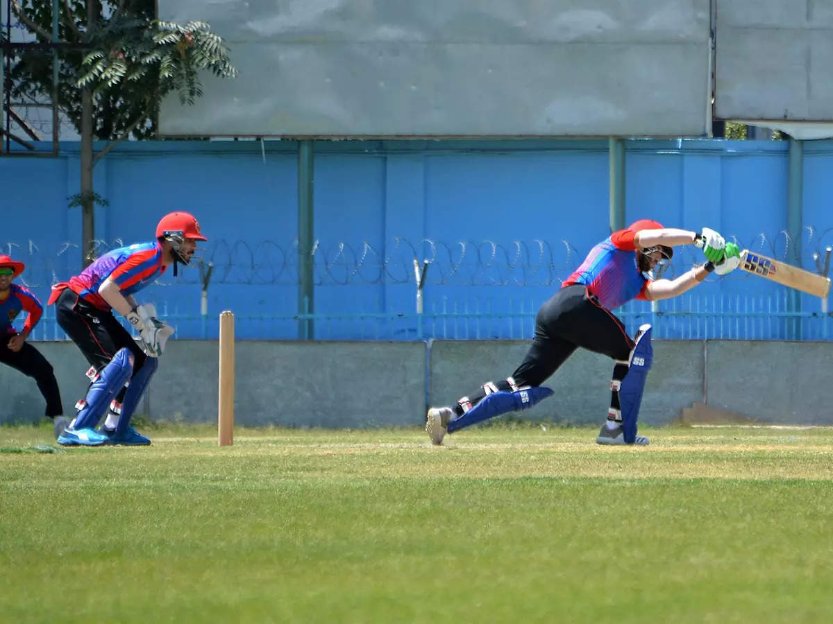 Afghan cricketers practicing at Kabul international stadium