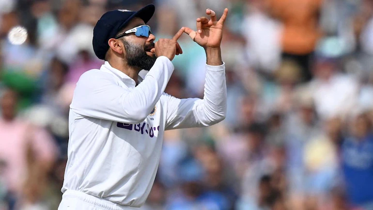 Virat Kohli's trumpet gesture. Photo-AP