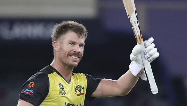 Australia's David Warner celebrates his fifty runs during the Cricket Twenty20 World Cup match against Sri Lanka in Dubai, UAE, Thursday, Oct. 28, 2021. (AP Photo/Aijaz Rahi)