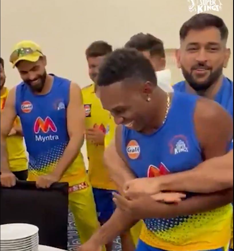 MS Dhoni Helps CSK Players Plaster Dwayne Bravo’s Face With Cake As He Celebrates His 38th Birthday. Photo- CSK Twitter