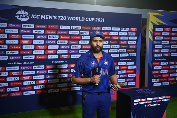 ABU DHABI, UNITED ARAB EMIRATES - NOVEMBER 03: Rohit Sharma of India looks on as they are interviewed following the ICC Men's T20 World Cup match between India and Afghanistan at Sheikh Zayed stadium on November 03, 2021 in Abu Dhabi, United Arab Emirates. (Photo by Gareth Copley-ICC/ICC via Getty Images)