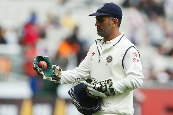 MELBOURNE, AUSTRALIA - DECEMBER 30: MS Dhoni of India leaves the field on day five of the Third Test match between Australia and India at Melbourne Cricket Ground on December 30, 2014 in Melbourne, Australia. (Photo by Chris Hyde/Getty Images)