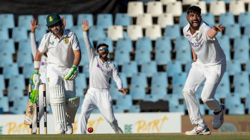 Dean Elgar and Mohammed Siraj. Photo- AP