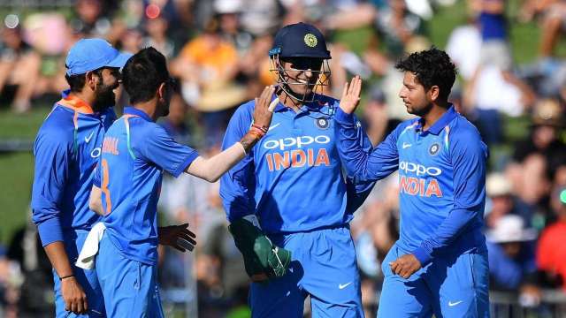 MS Dhoni with Yuzvendra Chahal and Kuldeep Yadav. Photo- AP