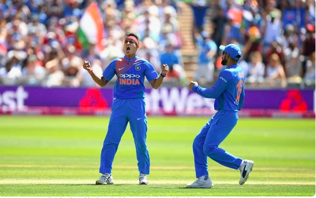 Siddarth Kaul and Virat Kohli