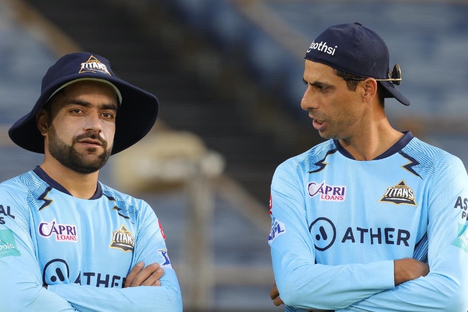 Rashid Khan with GT Head Coach Ashish Nehra