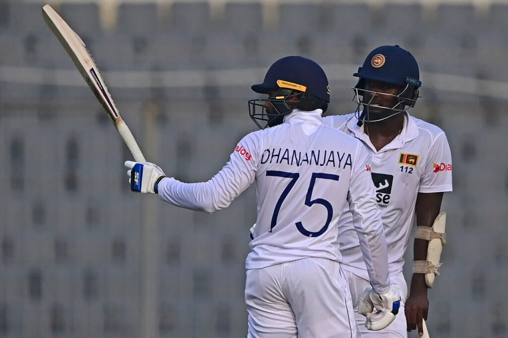 Dhananjaya de Silva and Angelo Mathews. Photo-AFP