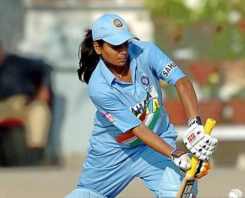 Karachi, PAKISTAN: Indian batswoman Karuna Jain plays a defensive shot during the second Asia Cup match against Sri lanka in Karachi, 29 December 2005. India's women cricketers began their Asia Cup defence convincingly, defeating Sri Lanka by ten wickets. AFP PHOTO/ Rizwan TABASSUM (Photo credit should read RIZWAN TABASSUM/AFP via Getty Images)