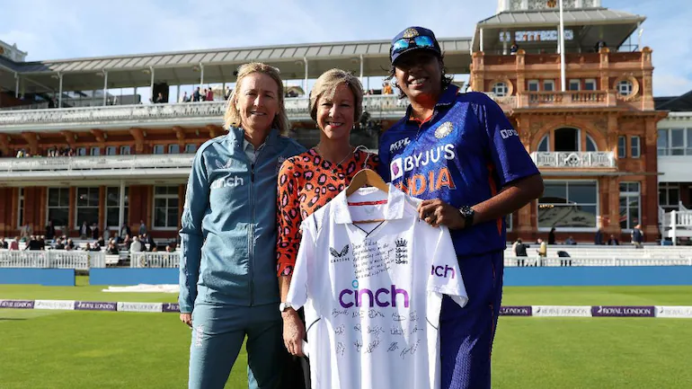 Jhulan Goswami presented with a signed England shirt.