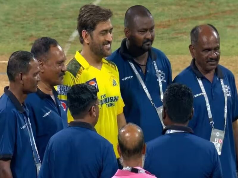 MS Dhoni with Groundstaff