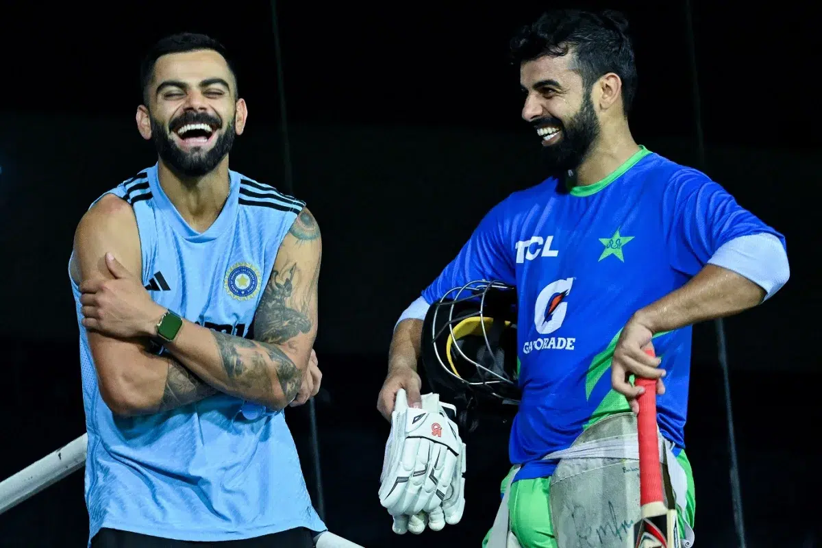Shadab Khan and Virat Kohli